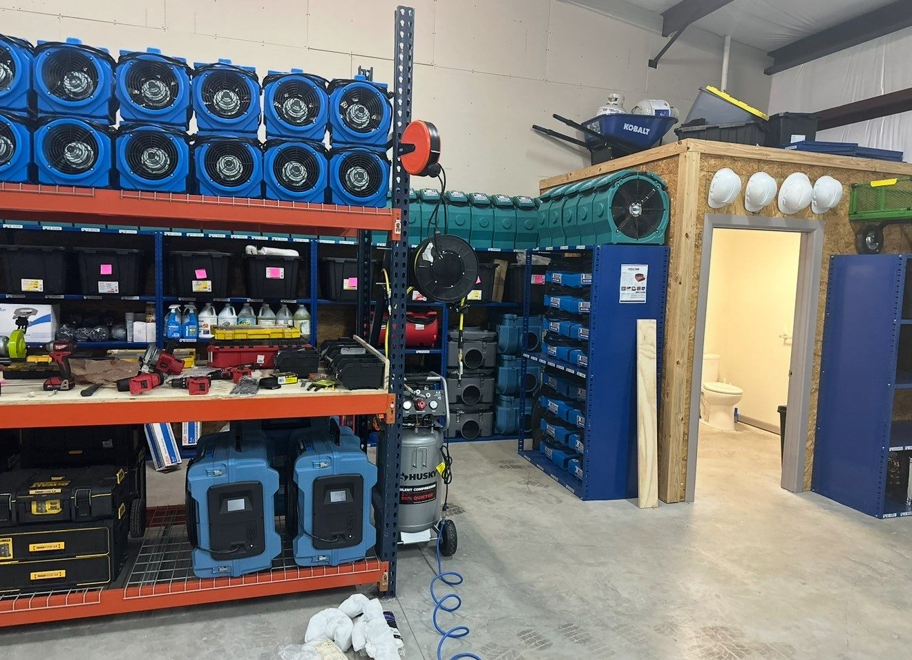 Commercial water removal in progress — industrial extraction equipment deployed